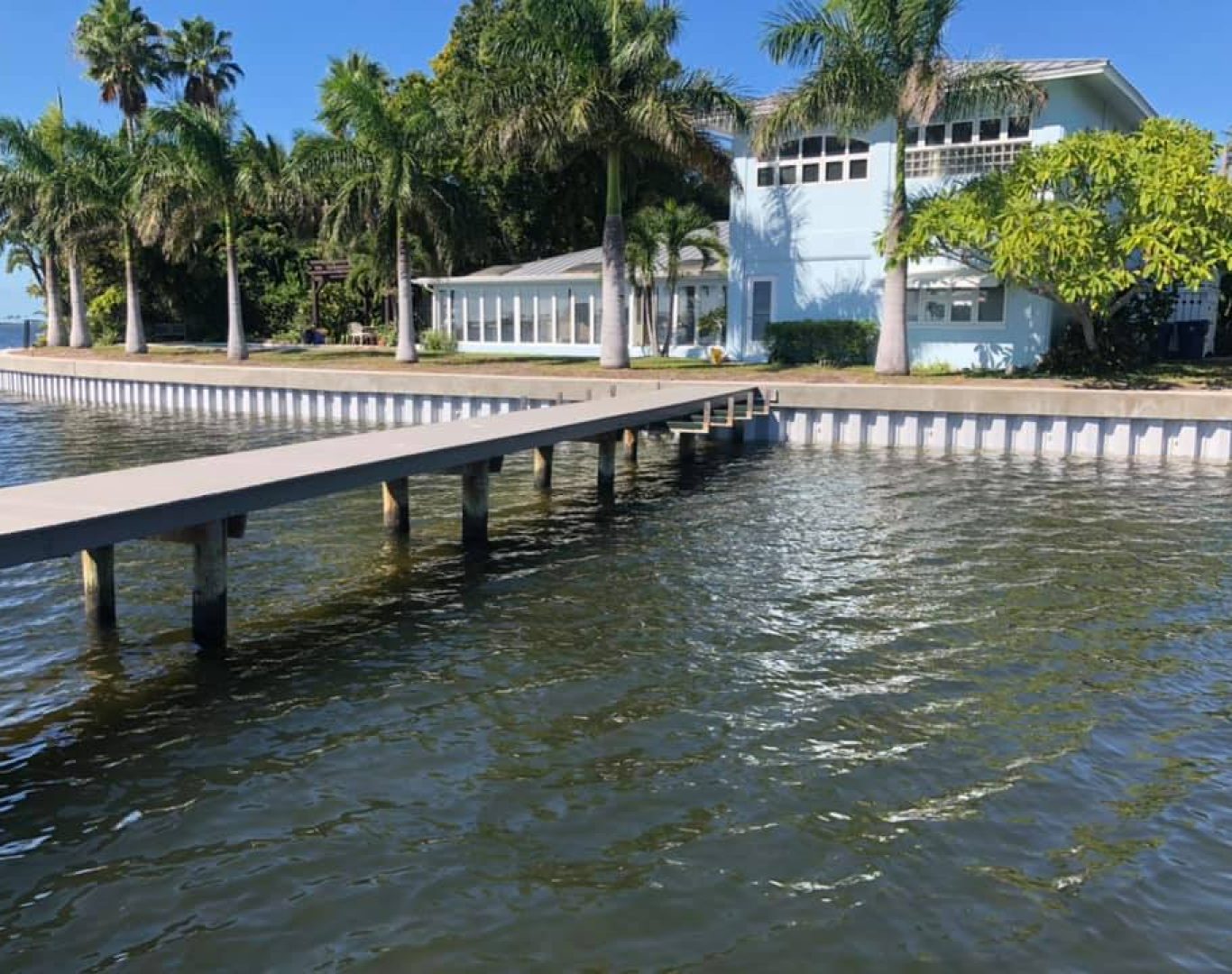 Finished seawall after repair near coastal property in Stuart, FL.